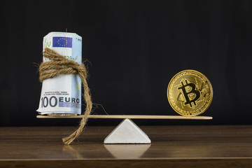 Seesaw Euro and Bitcoin , Finance Concept
