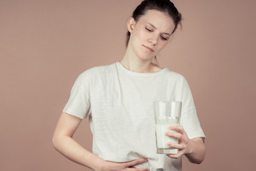 girl drinks milk and is happy