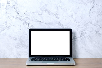 Fototapeta premium Mock up laptop.Laptop computer on student minimal workspace and marble wall.