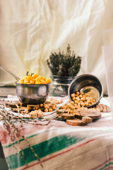 Fototapeta na wymiar Dried and boiled chickpeas. Vegetarian protein. Dry thyme sprigs in a jar. Healthy lifestyle and balanced food concept. Selective focus.