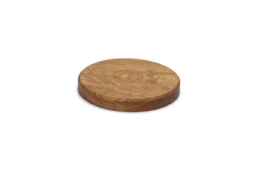 Round wooden stand with carved pattern on a white background. Is