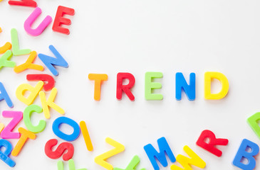 Trends concept. Coloured letters on white background. Be in trend