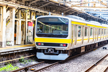 Fototapeta na wymiar Modern train in Tokyo railway station, Japan