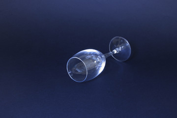 Wineglass from glass on a dark background