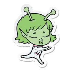 sticker of a cartoon alien girl