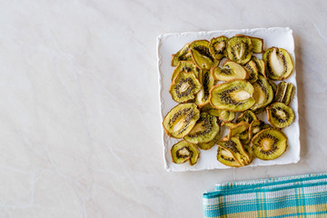 Dried Kiwi Slices with Plate / Organic Dry Fruit.