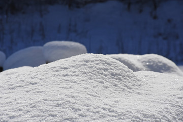Fototapeta na wymiar Snow close-up like white fabric