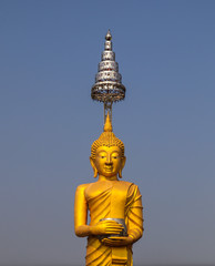 Buddha gold color on sky background