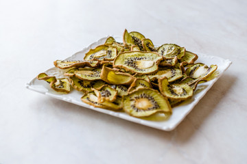 Dried Kiwi Slices with Plate / Organic Dry Fruit.