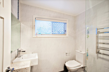 Small white bathroom interior