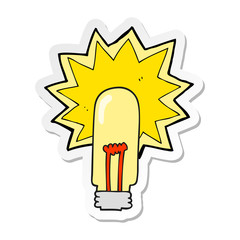sticker of a cartoon old light bulb