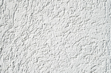 Fototapeta premium New white plaster on wall closeup