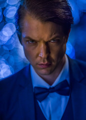 Night portrait of a caucasian handsome male