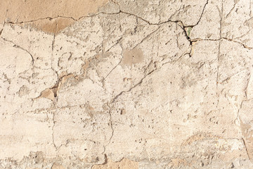 Background texture. Cracked concrete wall covered by grey cement surface