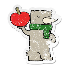 distressed sticker of a cartoon bear with apple