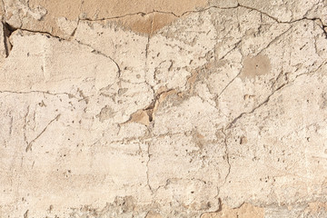 Background texture. Cracked concrete wall covered by grey cement surface