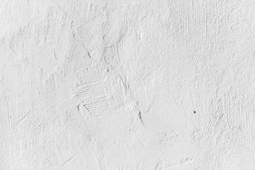 Background texture. Cracked concrete wall covered by grey cement surface