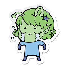 sticker of a cartoon crying alien girl