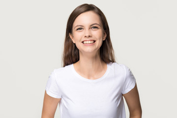 Fototapeta premium Happy cheerful girl looking at camera isolated on background