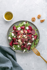 Beetroot salad with feta cheese, argula and walnuts