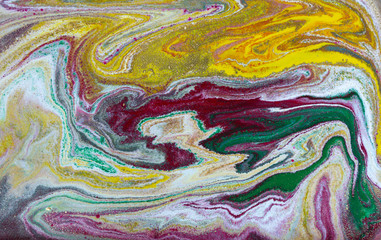 Multicolored gold marbling pattern. Golden marble liquid texture.