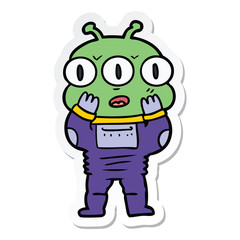 sticker of a surprised three eyed alien