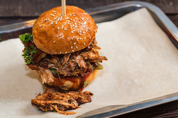 Close up tasty burger with minced meat served on tray