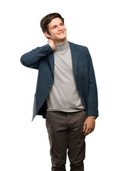 Teenager man with turtleneck thinking an idea while scratching head over isolated white background