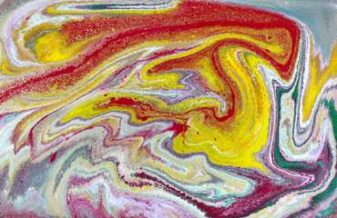Multicolored gold marbling pattern. Golden marble liquid texture.