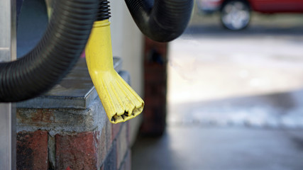 Car wash vacuum with yellow nozzle