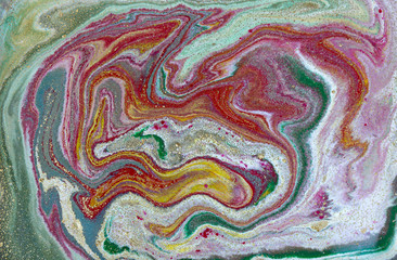 Multicolored gold marbling pattern. Golden marble liquid texture.