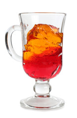 Coctail in a glass with raw fruit on white background