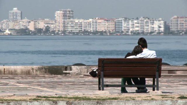 couple sitting on bench