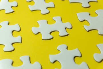 puzzle on yellow paper