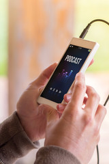 hands holding podcast smartphone