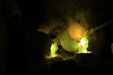 Molten Gold being poured into Ingot Mould