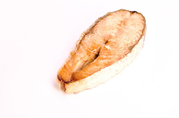 grilled salmon fish with salt and pepper on white background