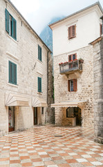 Fototapeta na wymiar Old european city street view with colorful buildings In Montenegro Budva