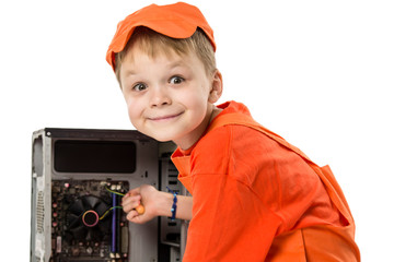 cute boy repairing computer system unit on white background