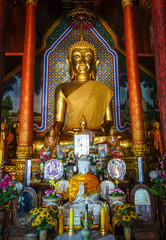 Buddha statue in Wat Chomphu temple, Chiang Mai, Thailand