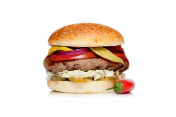  Juicy burger with a big cutlet, cheese, cucumber, tomato, onion, cabbage, sauce and sesame bun on a white background