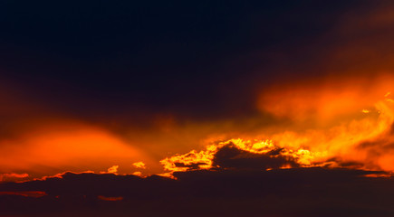 Beautiful sunset with dramatic clouds on the sky