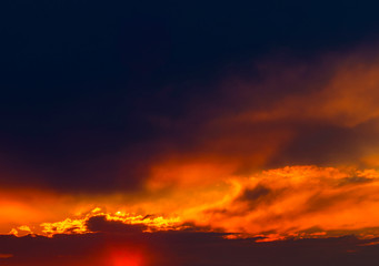 Beautiful sunset with dramatic clouds on the sky