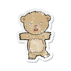 retro distressed sticker of a cartoon shocked teddy bear