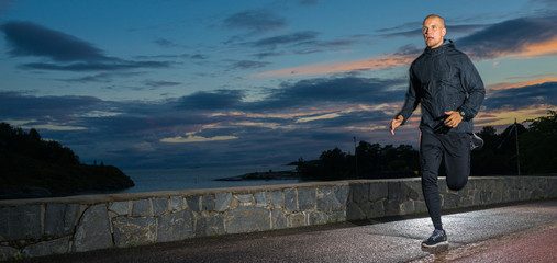 Urban Male Runner in a moon light