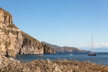 Vessels anchored in a bay in Sicily enjoying a marvelous summer view