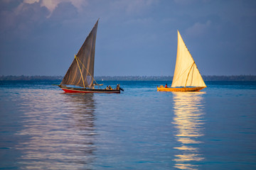 Two sailboats on the water surface.  Zanzibar island , Tanzania, Africa.