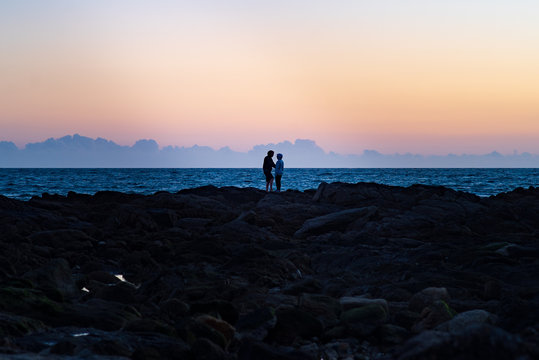 couple silhouette sunset