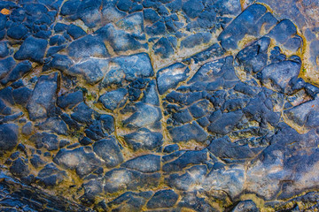 Closeup - beautiful structure of an ancient rock texture formation. Concept of natural background...