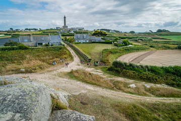 Batz island lighthouse and houses in Bretagne in the summer